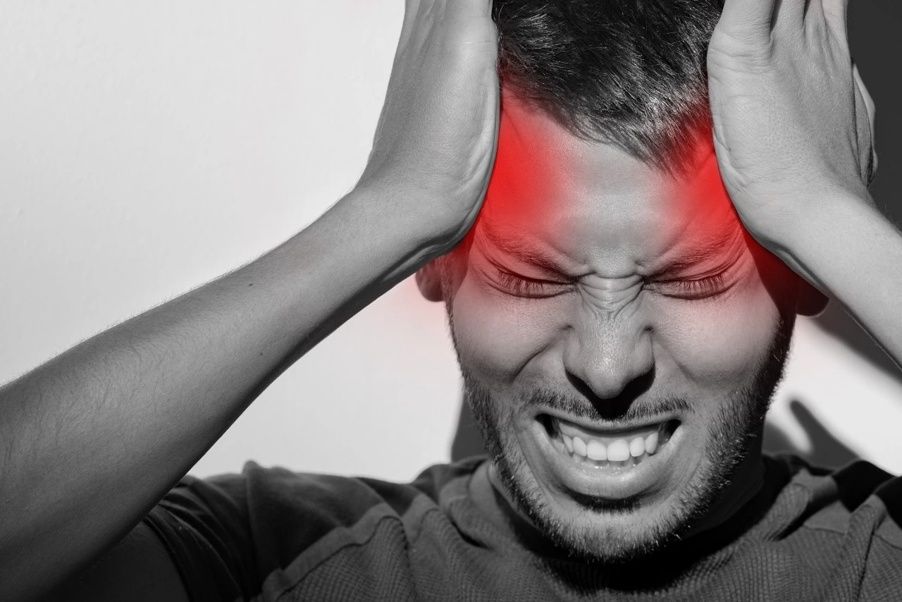 Image of a person having headache/ sever headache/ डोकेदुखी